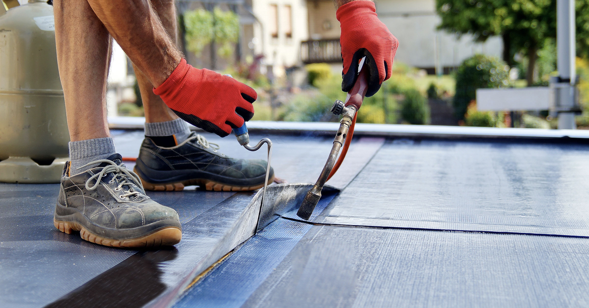 Tasker performing a Waterproofing job.
